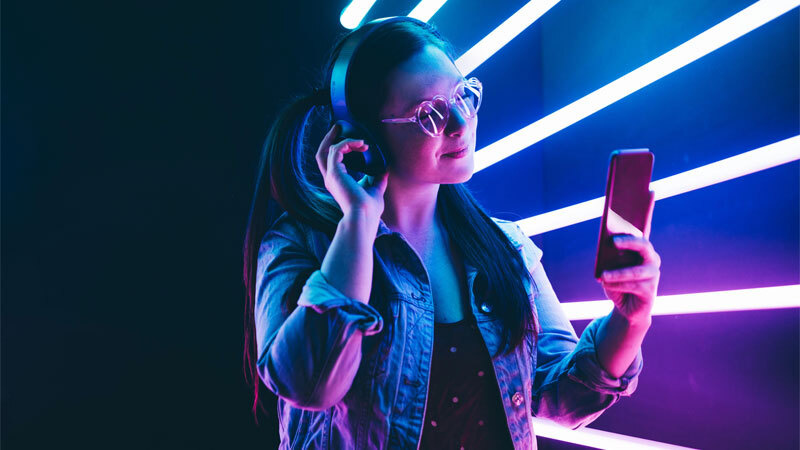 Alphabet Tik Tok Woman Holding Phone Neon Lights