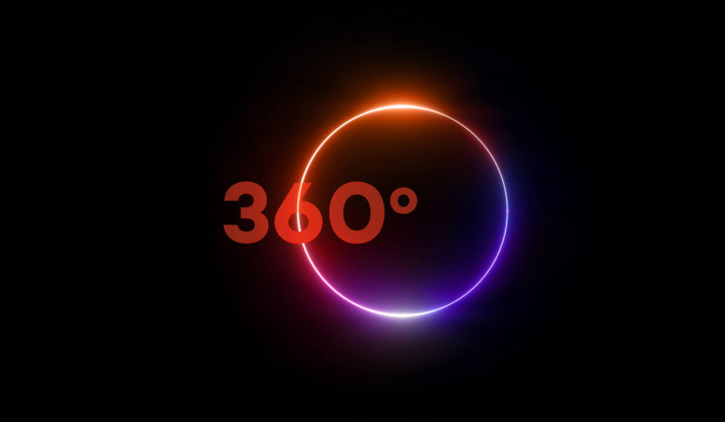 Glowing neon circle on a black background with the text “360°” centred in bold red, suggesting a full-circle perspective.