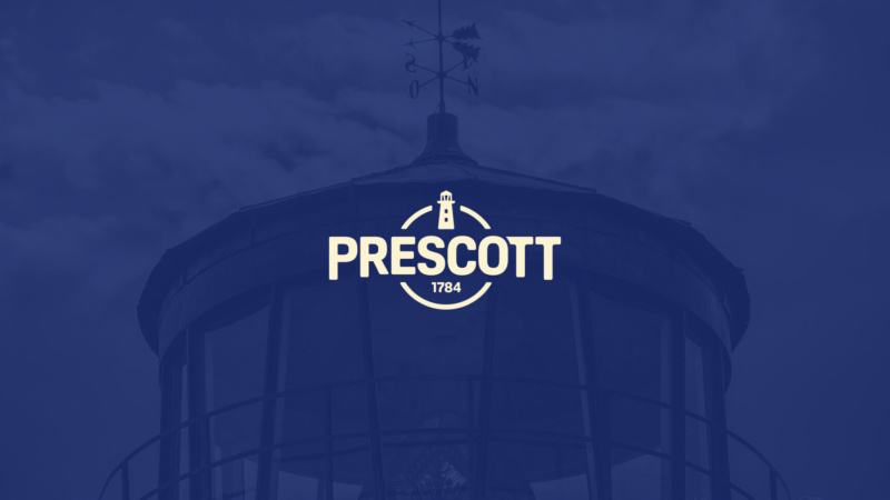 Prescott logo with lighthouse icon and “1784” displayed over a dark blue background.