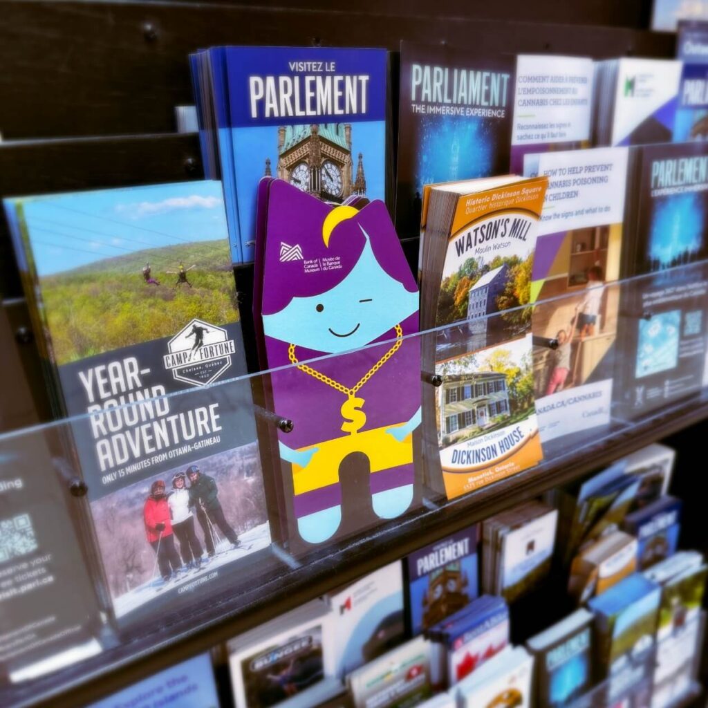 brochure created by alphabet creative as it looks compared in a stand with other brochures