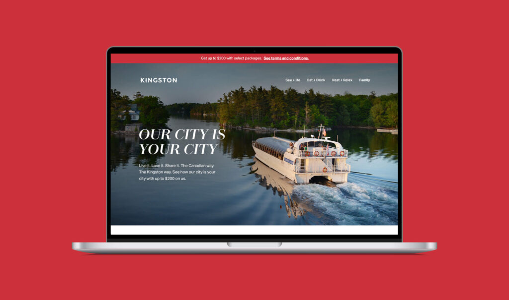 laptop with tourism kingston campaign displayed